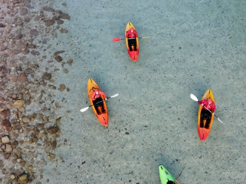 White water kayaking on the emerald Soča river