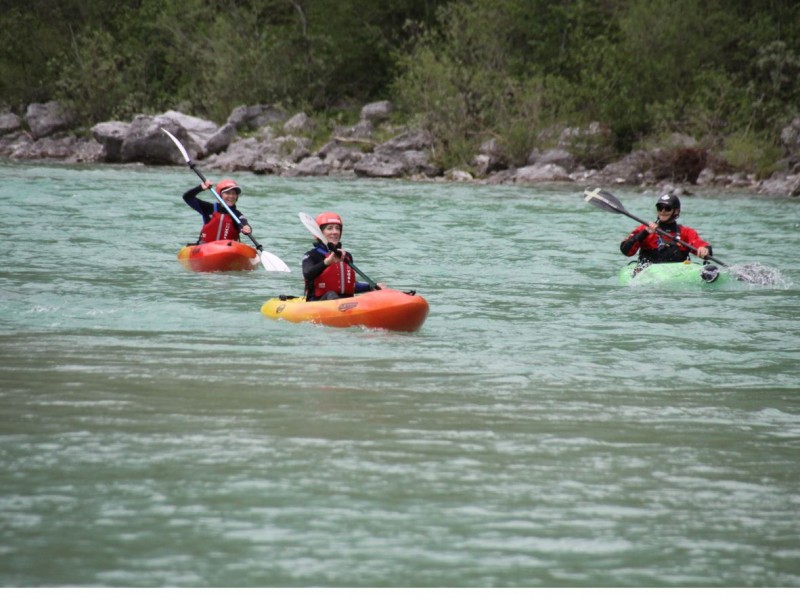 White water kayaking on the emerald Soča river