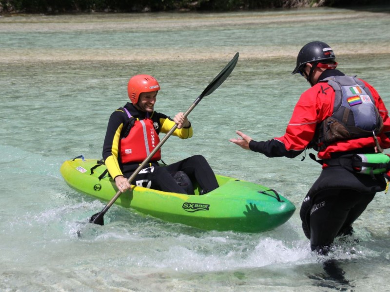 White water kayaking on the emerald Soča river